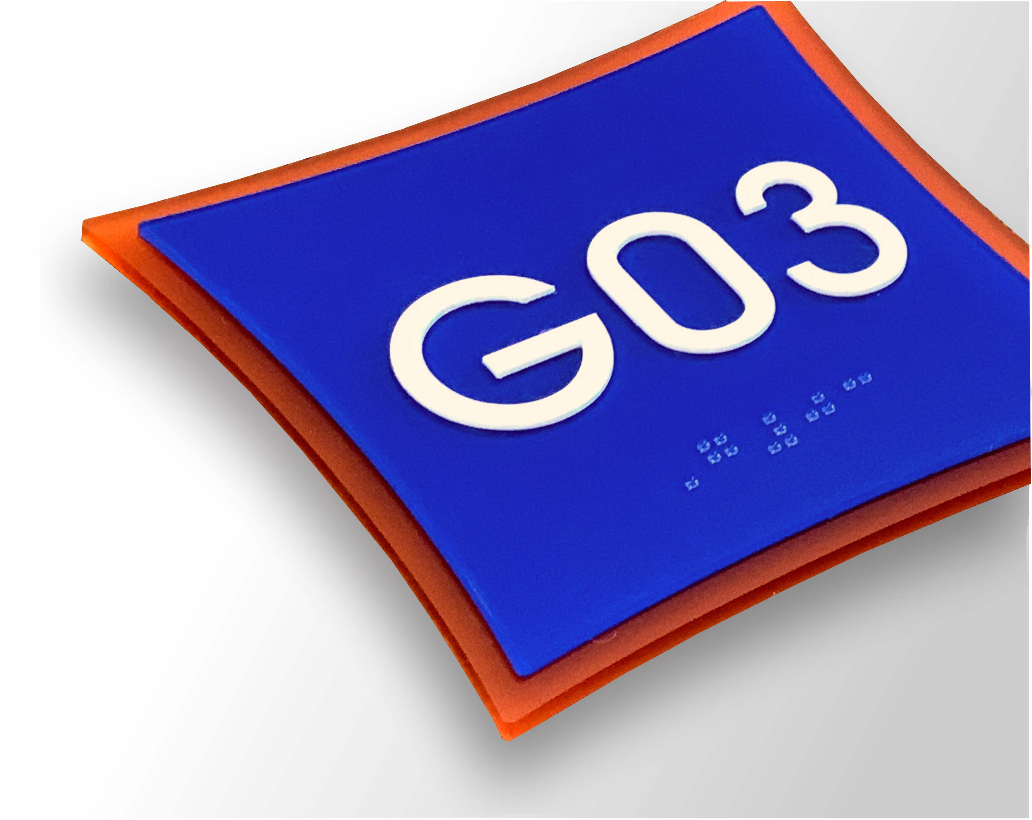 Urban ADA braille sign with translucent acrylic backer and floating architectural design